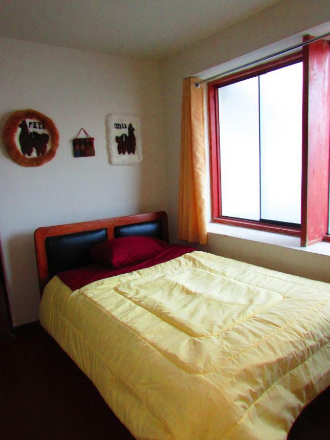 The Grasshopper Hostels Av Alta Cuzco Exterior photo